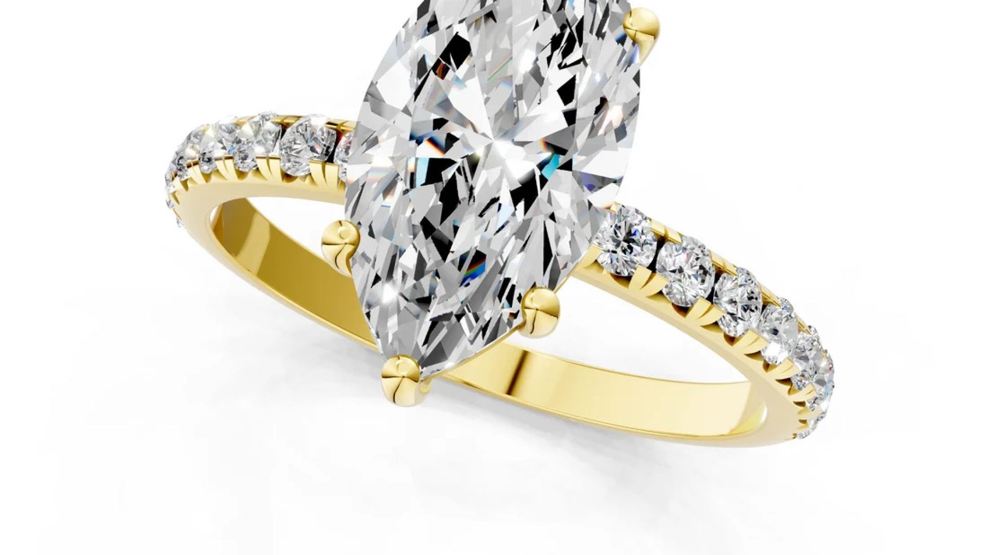 ⁣Yellow gold Marquise Cut Diamond Solitaire Ring